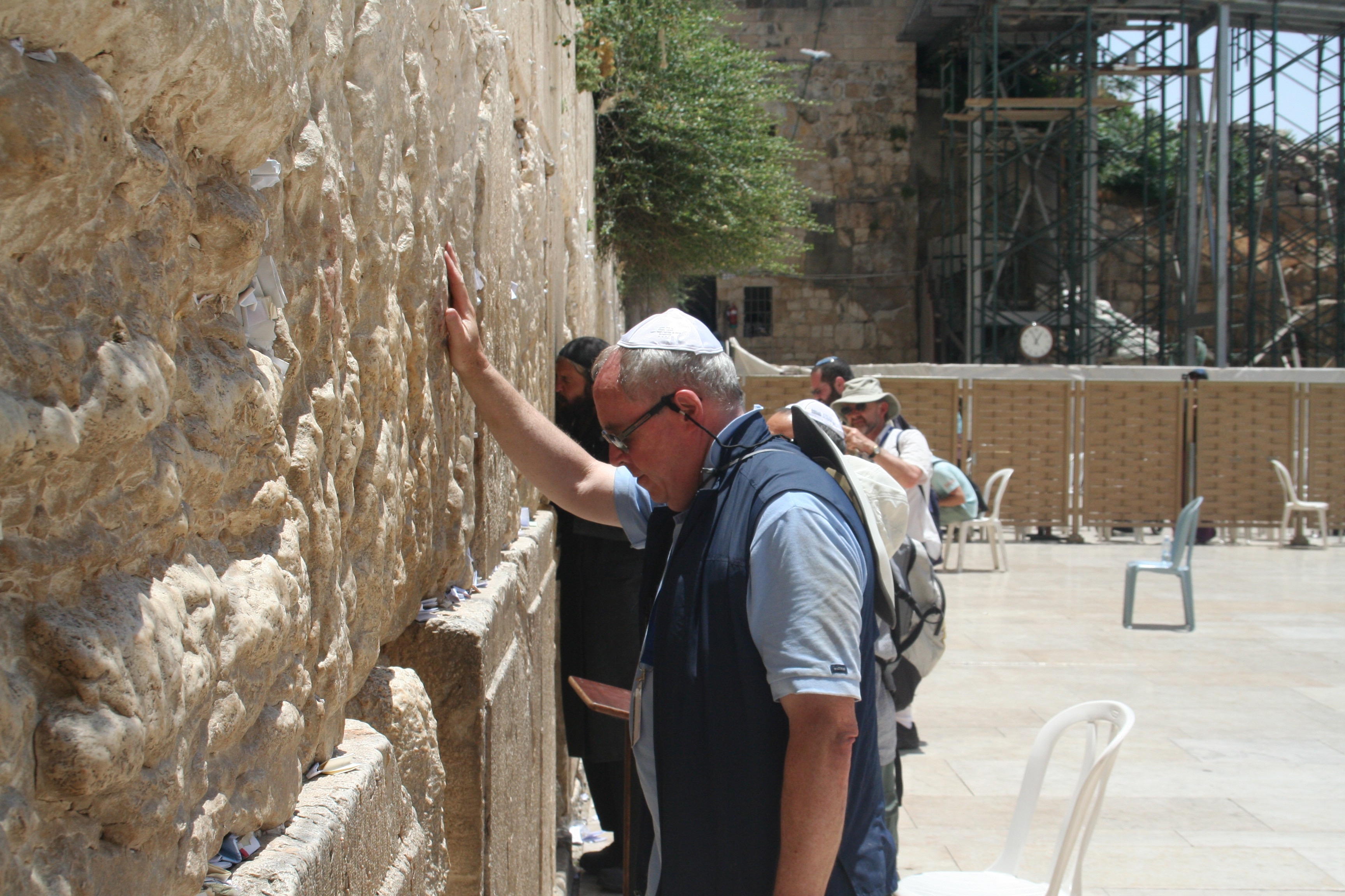 Praying at teh Western Wall in Jerusalem